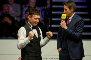 Jimmy White celebrates post match as he is interviewed by Rob Walker.