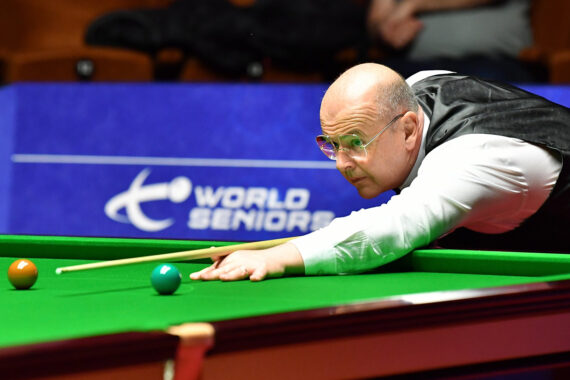 Philip Williams plays a shot at the 2022 World Seniors Snooker Championship