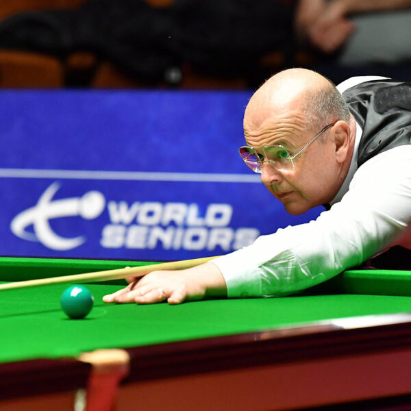 Philip Williams plays a shot at the 2022 World Seniors Snooker Championship