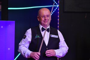 Philip Williams walks out at the Crucible Theatre for the 2022 World Seniors Snooker Championship.